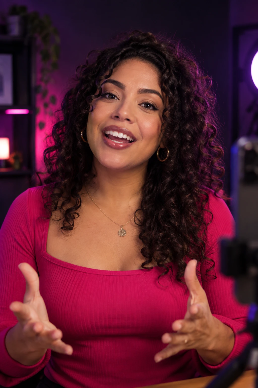 Illustrative scene: a smiling creator speaking to a camera in a pink studio with a phone on a tripod.
